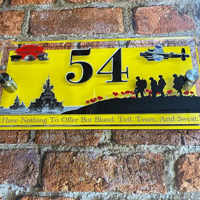'Land Sea & Air' house sign